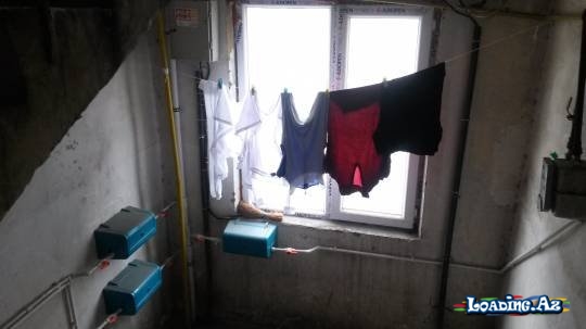 Eyvanlardan kəsilən paltar ipləri bloklara “köçdü” - Sun.Az