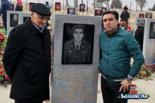 Dilqəm Əsgərov onu türmədən qurtarmaq istəyən şəhid zabitimizin məzarını ziyarət edib - Sun.Az