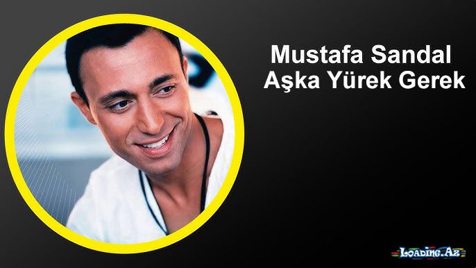 Mustafa Sandal - Aşka Yürek Gerek ( Official Video )